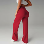 A woman wearing Arenzza women's plain loose straight-leg pants in neutral fabric, showcasing a relaxed fit and casual style.