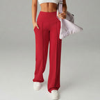 A pair of women's plain loose straight-leg pants by Arenzza, shown in a neutral color on a model.