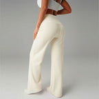 A pair of women's loose straight-leg pants in neutral color by Arenzza, designed for comfort and casual wear.