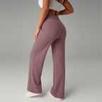 A pair of women's plain loose straight-leg pants by Arenzza, displayed on a model, in a neutral fabric with a relaxed fit.