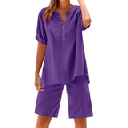 A woman wears a white cotton linen 2-piece outfit set by Arenzza, featuring a relaxed top and matching pants for casual style.