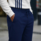 Men's graphic print pullover and pants set by Arenzza, featuring a stylish coordinated clothing ensemble with bold design details.