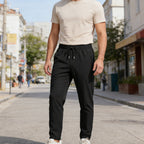 Men's lightweight athletic pants by Arenzza with zipper pockets, made of breathable fabric for active wear and sports.