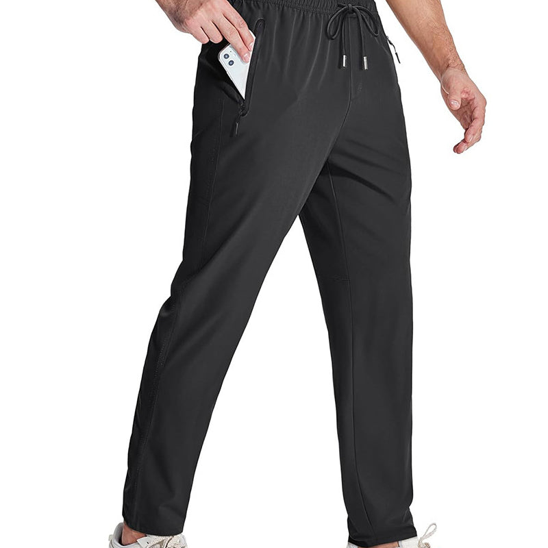 Men's lightweight athletic pants with zipper pockets by Arenzza, shown in a relaxed fit with functional zipper details.