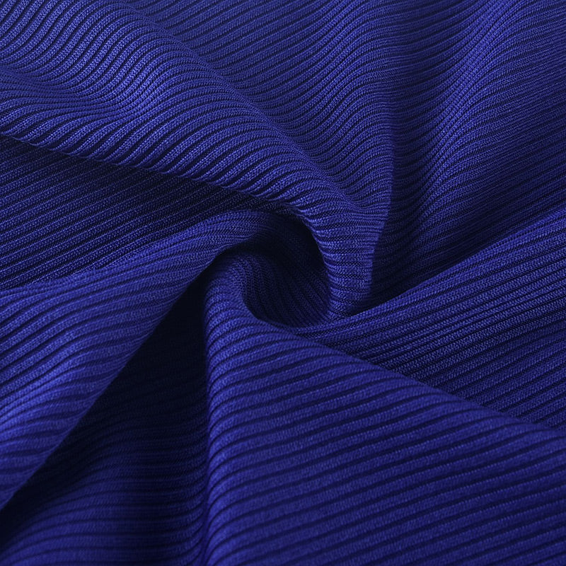 A woman wearing a solid color half zip seamless jumpsuit by Arenzza, showcasing its fitted design and soft fabric details.