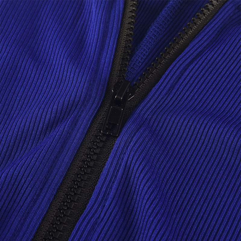 A black Arenzza solid color half zip seamless jumpsuit with long sleeves and fitted design, displayed flat on a white background.