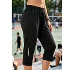 A pair of lightweight, breathable Arenzza women's quick-dry stretchy capri pants, ideal for travel, yoga, or casual wear.