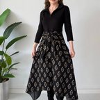 Aarenza tie-waist fit and flare midi dress in a stylish, flowing design displayed on a hanger with a neutral background.