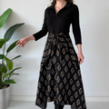 Aarenza tie-waist fit and flare midi dress in elegant fabric, featuring a flattering waist tie and classic silhouette.