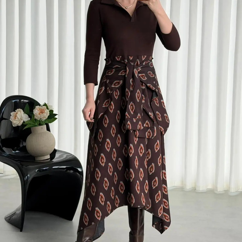 Aarenza tie-waist fit and flare midi dress with sleeveless design, lightweight fabric, and floral pattern on a model.