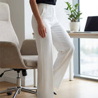 A pair of women's high-waist dress pants from Arenzza in a sleek, tailored fit, shown on a model against a neutral background.