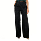A pair of high-waist glitter straight-leg trousers from Arenzza, featuring shiny fabric and tailored fit, displayed on a hanger.