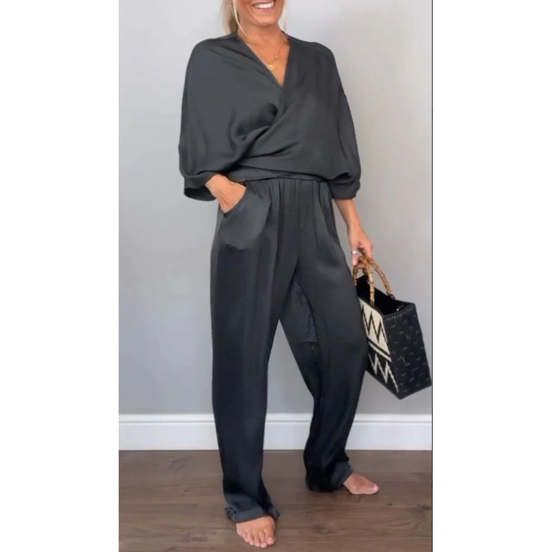 Women's Arenzza 2-piece wrap V-neck top and pants set, stylish clothing with a comfortable fit, displayed on a neutral background.