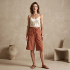 A pair of women's casual drawstring Capri shorts by Arenzza, featuring a comfortable fit and lightweight fabric in a neutral color.
