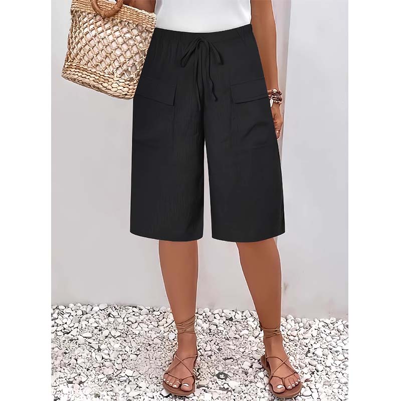 A pair of women's casual drawstring Capri shorts by Arenzza, featuring a relaxed fit and lightweight fabric in a beige color.