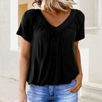 Women's casual pleated V-neck short-sleeve top by Arenzza, featuring a relaxed fit and stylish pleats in a soft fabric.