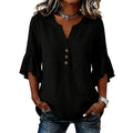 A woman wearing a solid color V-neck top by Arenzza, casual women's clothing, close-up of the stylish V-neck and soft fabric.