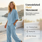 A woman wearing a women's casual V-neck top and wide-leg pants set by Arenzza, showcasing a comfortable, stylish clothing ensemble.