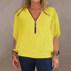 Women's chiffon zip-up neck casual top by Arenzza, featuring a lightweight fabric and relaxed fit, shown on a model.