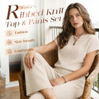 A woman wearing a beige ribbed knit top and wide-leg pants set by Arenzza, showcasing the stylish, comfortable clothing ensemble.