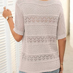 A women's hollow knit crochet short sleeve sweater with a round neckline from Arenzza, showcasing its textured fabric and short sleeves.