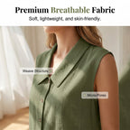 Women’s V-neck button-down top by Arenzza, light fabric, fitted style, with a row of buttons down the front, shown on a hanger.