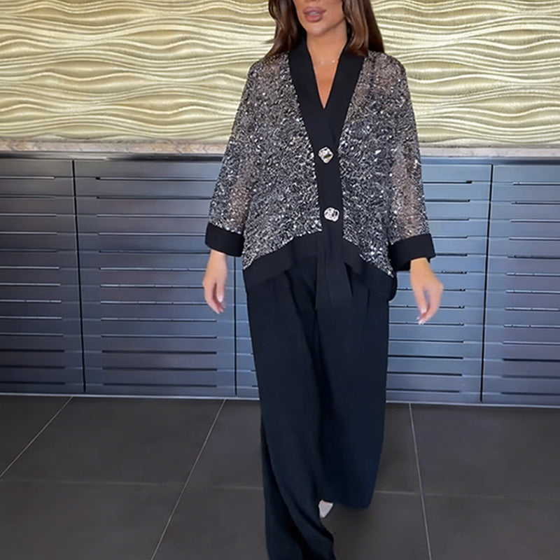 A woman wearing the Arenzza women's V-neck sequin cardigan and wide-leg pants 2-piece set, showcasing the stylish, shimmering outfit.