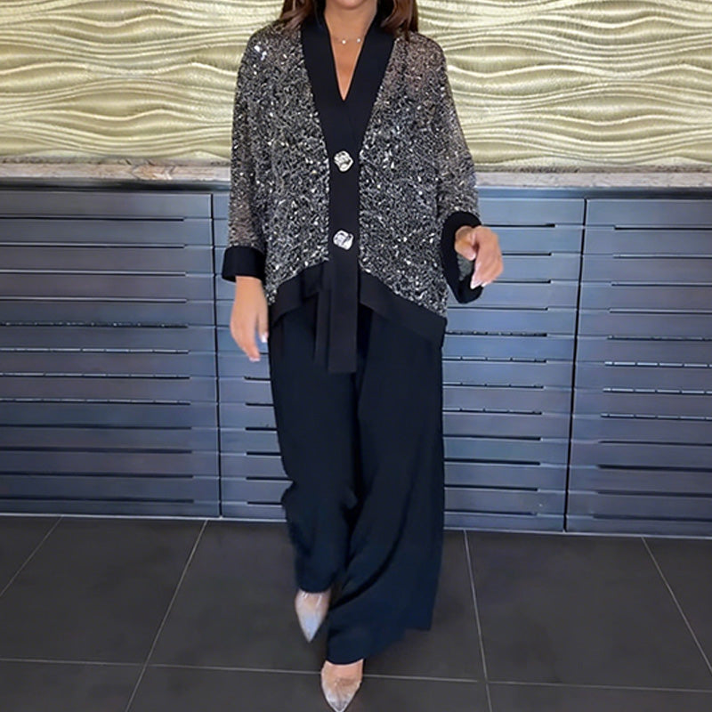 A woman wearing a stylish Arenzza women's V-neck sequin cardigan and wide-leg pants 2-piece set, featuring shimmering sequins and flowy fabric.
