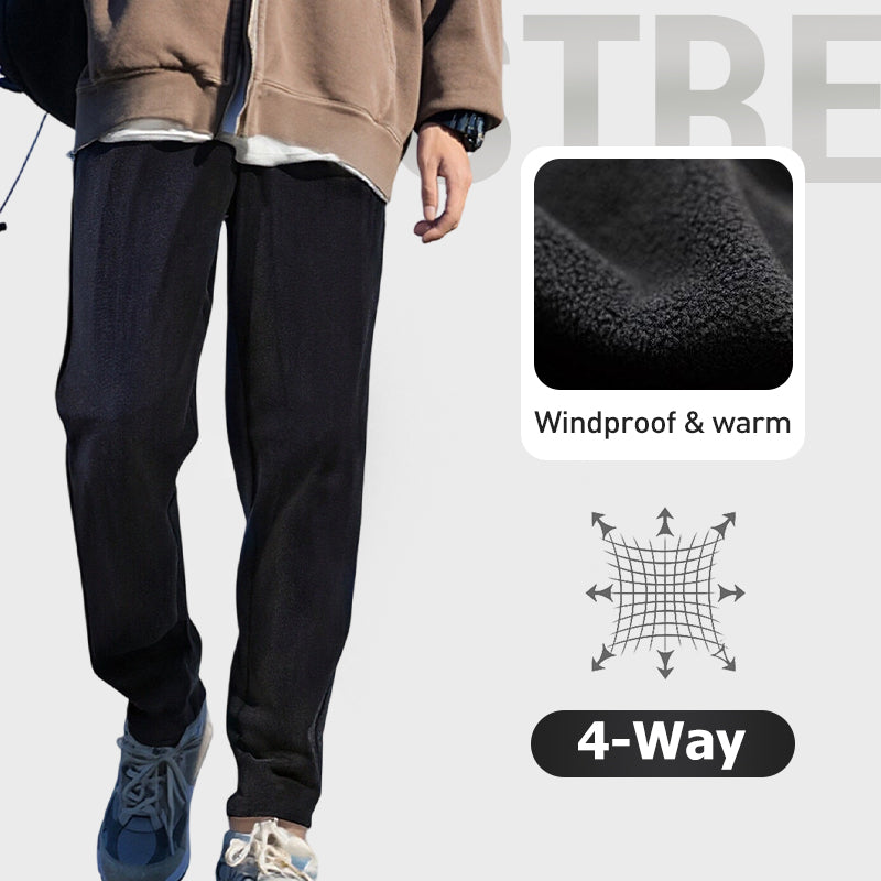 Unisex solid color windproof thermal pants in black, designed for cold weather, by Arenzza, showing the front view of the pants.