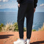 Unisex solid color windproof thermal pants from Arenzza, lightweight and designed for warmth and wind resistance.