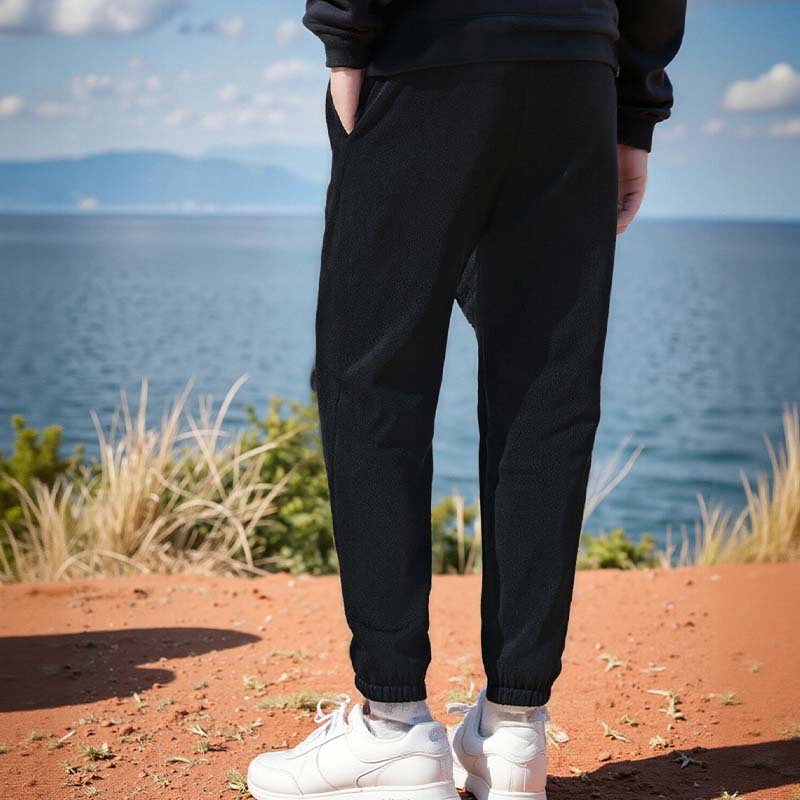 Unisex solid color windproof thermal pants from Arenzza, lightweight and designed for warmth and wind resistance.
