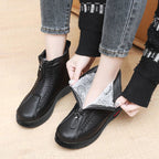 A pair of Arenzza women's winter ankle boots with thermal insulation, water resistance, and side zipper for easy wear.