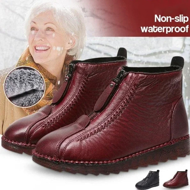 A pair of Arenzza women's winter ankle boots with side zippers, thermal insulation, and water-resistant material on a neutral background.