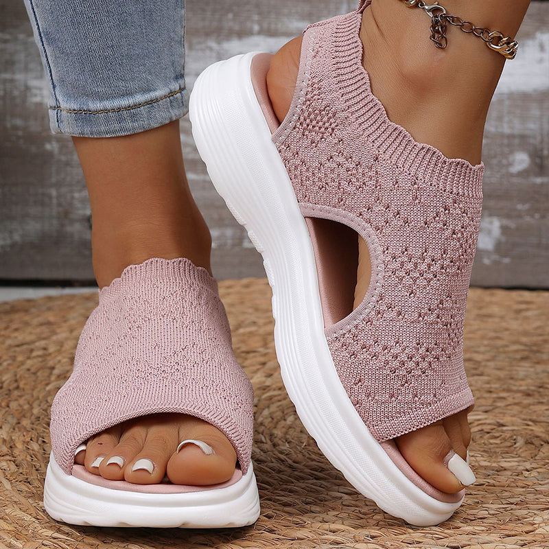 A pair of women's breathable knit platform sandals by Arenzza, featuring open toes and chunky heels, on a neutral background.