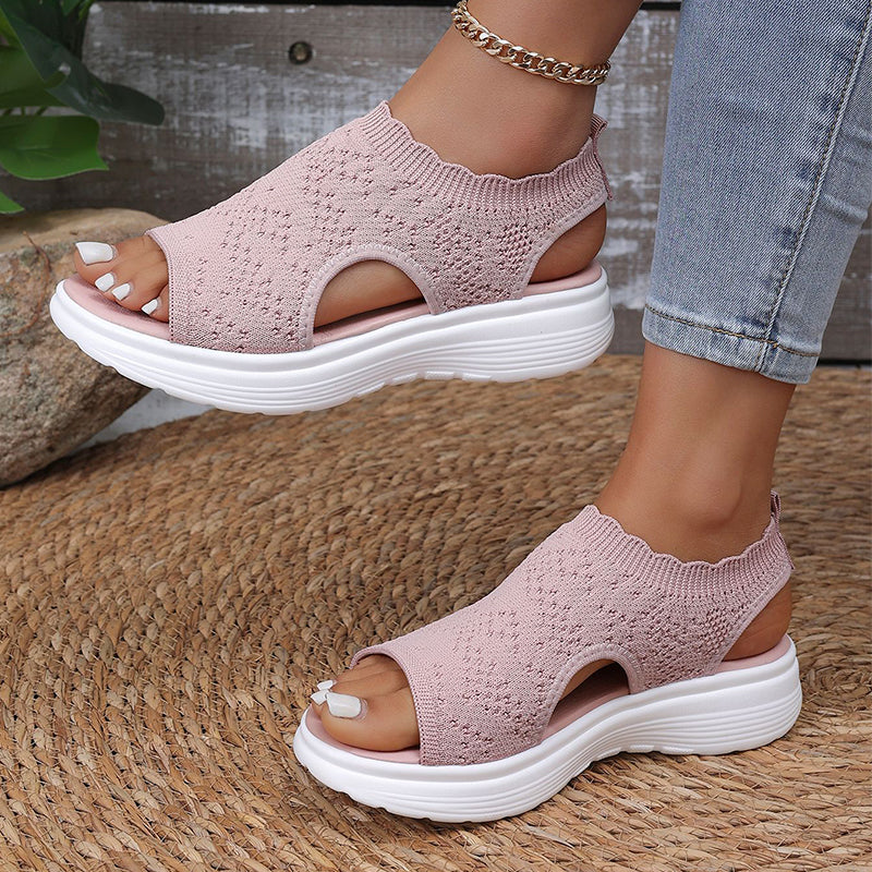 A pair of Arenzza women's breathable knit platform sandals with open toes and ankle straps, perfect for warm weather.
