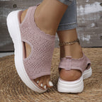 A pair of women’s breathable knit platform sandals by Arenzza, featuring open toes and a textured knit design.