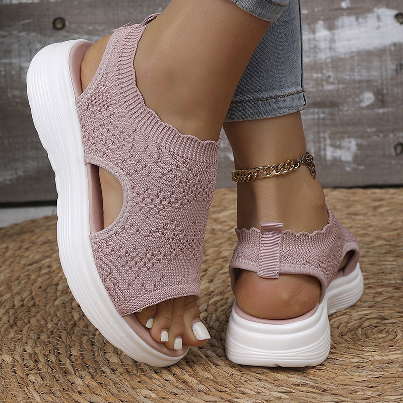 A pair of women’s breathable knit platform sandals by Arenzza, featuring open toes and a textured knit design.