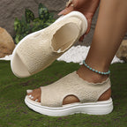 A pair of women's breathable knit platform sandals by Arenzza, featuring open toes and woven straps for stylish comfort.