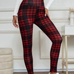 A woman wearing high-elasticity slim fit warm plaid leggings by Arenzza, showcasing their snug fit and stylish plaid pattern.