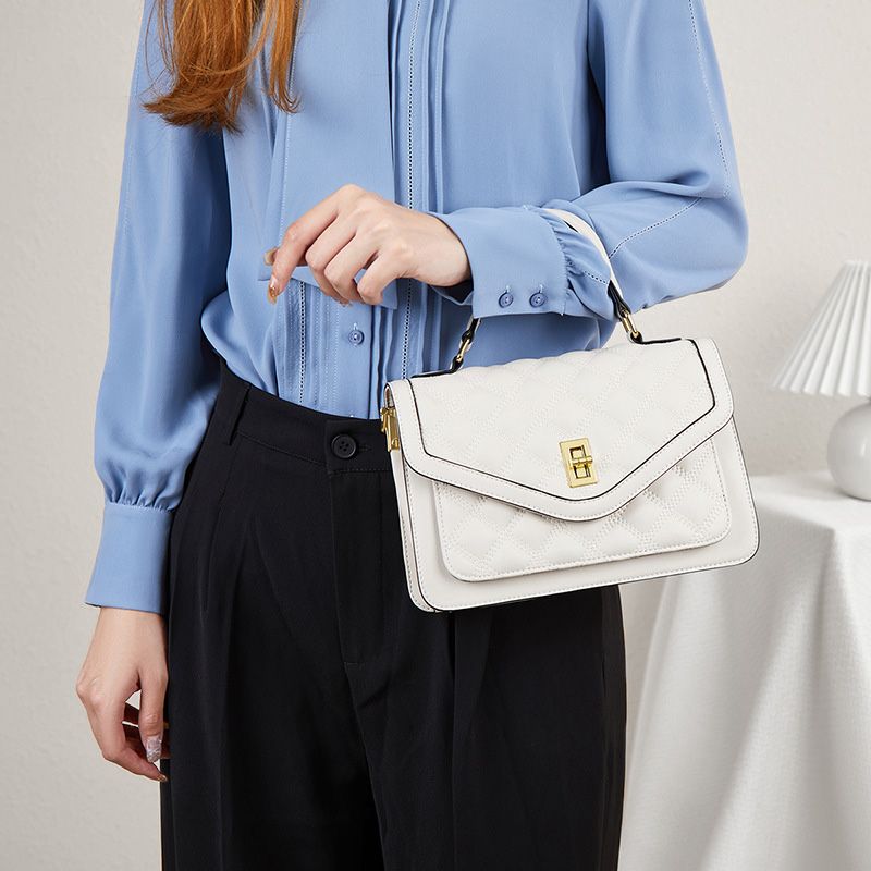 Aarenza women's casual crossbody shoulder bag in neutral color, featuring a sleek design and adjustable strap for everyday wear.
