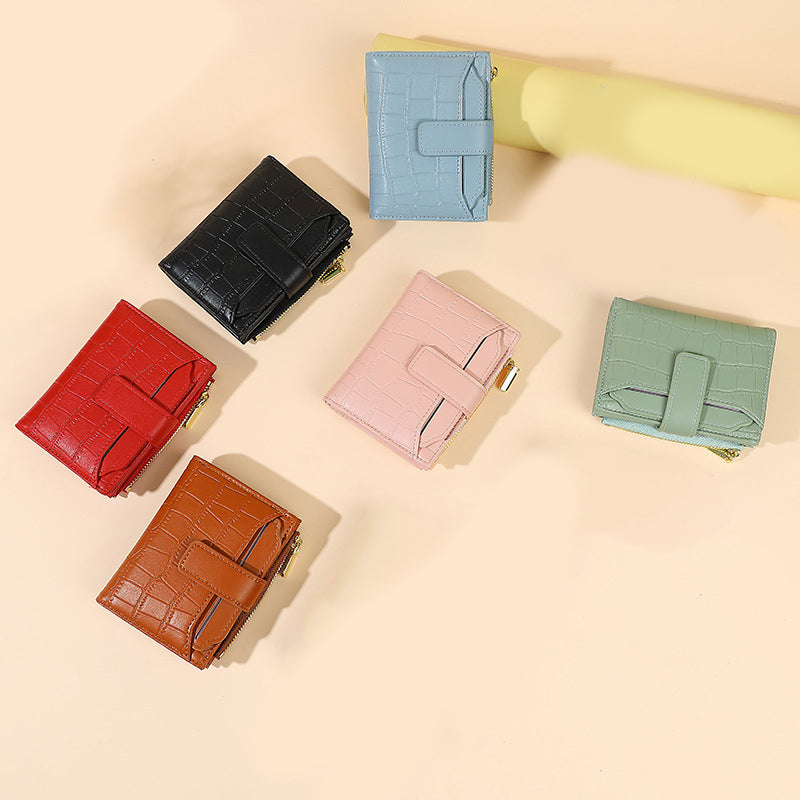 Arenzza women's compact solid color wallet with a sleek design, featuring multiple card slots and a smooth finish.