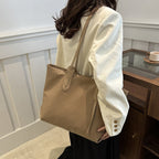 Arenzza women's retro multifunctional large capacity shoulder bag with multiple compartments and adjustable strap, stylish and versatile.