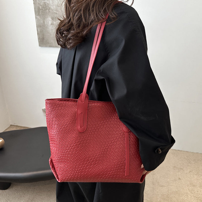 A Women's Retro Multifunctional Large Capacity Shoulder Bag by Arenzza featuring a stylish design and spacious interior for accessories.
