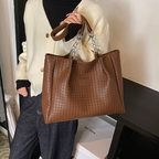 Women’s synthetic leather tote bag by Arenzza, featuring a spacious design with sturdy handles and a sleek, stylish finish.