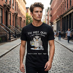 Aarenza owl "I'm Not Old" graphic T-shirt in black with colorful owl illustration and humorous text, casual clothing for adults.