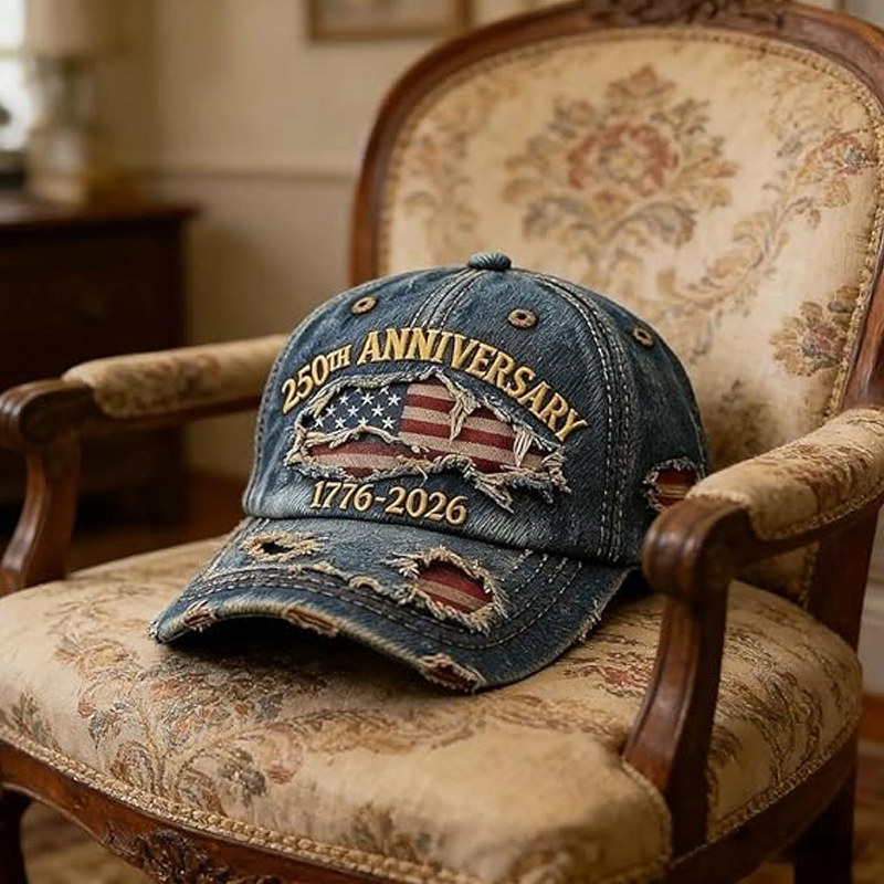 A distressed baseball cap by Arenzza with anniversary 250th logo, featuring a casual, vintage style in neutral tones.