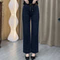 Women’s casual straight-leg pants by Arenzza, featuring a relaxed fit and classic design, shown in a neutral color on a model.