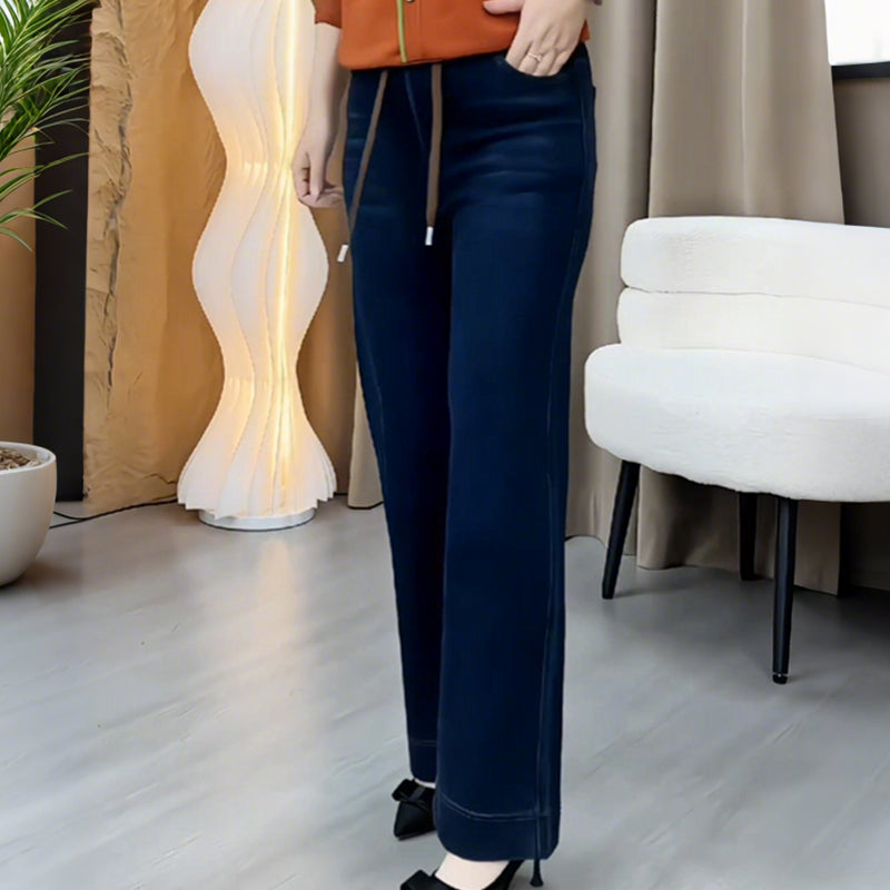 A pair of women’s casual straight-leg pants by Arenzza, featuring a relaxed fit and neutral color, displayed on a white background.