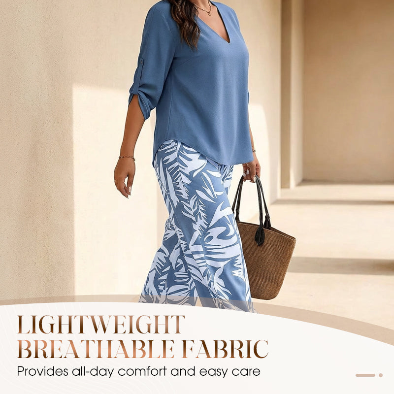 Aarenza women's V-neck blouse and printed wide-leg pants set, stylish clothing ensemble with vibrant patterns and comfortable fit.
