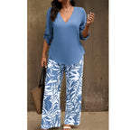 Arenzza women's V-neck blouse and printed wide-leg pants set, stylish clothing ensemble with floral print and flowing fabric.